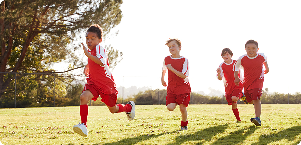 children playing soccer